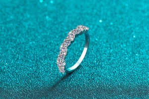 Macro detail of S925 sterling silver ring with baguette and round moissanite stones