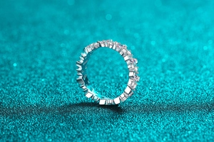 Detail view of S925 sterling silver eternity ring with rectangular and round moissanite