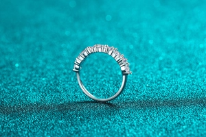 Macro shot of S925 sterling silver ring with sparkling round-cut moissanite stones