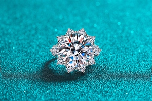 Macro shot of 10-carat moissanite ring with floral halo and brilliant cut stones