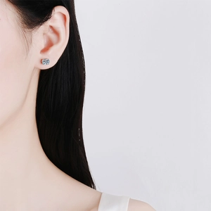 Elegant S925 sterling silver stud earrings with a brilliant round moissanite gemstone