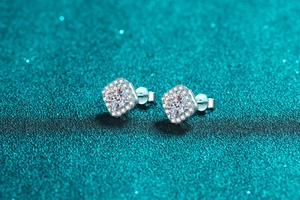 Macro shot of S925 sterling silver square stud earrings with sparkling moissanite stones