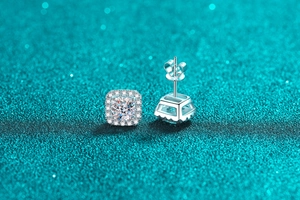 Macro shot of S925 silver square halo moissanite studs with butterfly backings
