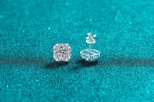 Macro shot of S925 sterling silver square moissanite earrings with halo setting detail