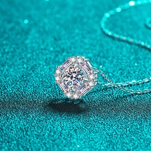 Octagon S925 sterling silver necklace with halo moissanite pendant on teal background