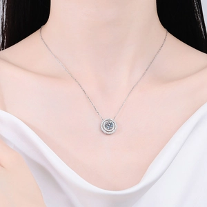 Elegant S925 sterling silver necklace featuring double circle moissanite pendant on model