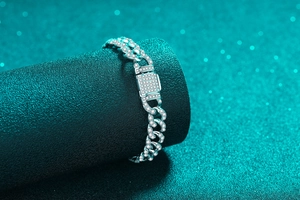 Macro view of S925 sterling silver Cuban link bracelet with full moissanite stones