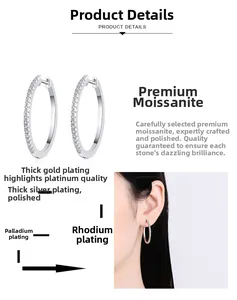 Detailed view of large S925 silver hoop earrings featuring pavé-set moissanite stones