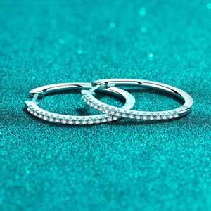 S925 sterling silver hoop earrings for women with moissanite pave setting on blue background