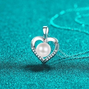 Elegant S925 sterling silver heart necklace with a round freshwater pearl and pavé crystals