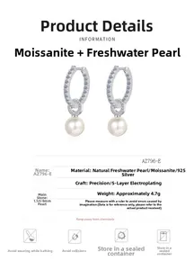 Detail view of S925 silver earrings with 1.1ct moissanite and 8mm freshwater pearl stones