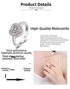 Makro-Detail des herzförmigen Moissanit-Rings mit mehrlagigem Halo und Goldbeschichtung