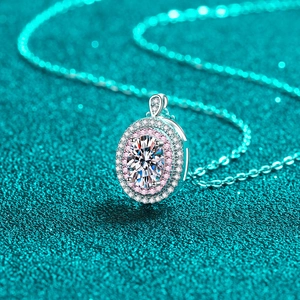 Elegant S925 sterling silver necklace featuring an oval moissanite pendant with pink halo