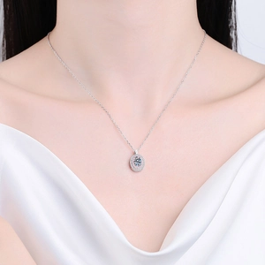 Elegant S925 silver necklace featuring oval moissanite pendant with pink halo on model