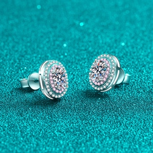 Oval moissanite stud earrings in 925 silver with pink and blue halo on glitter background