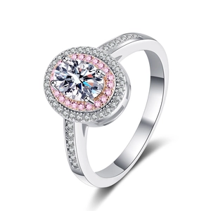 925 silver ring featuring an oval moissanite with double halo and pink accent stones