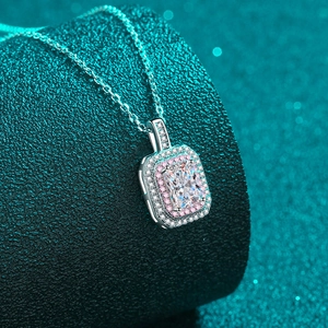Elegant 925 silver necklace featuring emerald cut moissanite with dual-color halo design