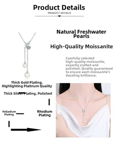 Détail du collier en Y en argent avec papillon en moissanite et perles d'eau douce