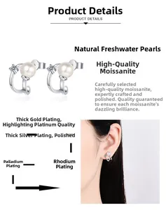 Detail view of U-shaped silver earrings featuring freshwater pearls and moissanite stones