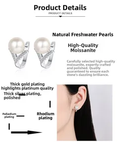 Macro detail of V-shaped sterling silver earrings with fresh water pearl and moissanite