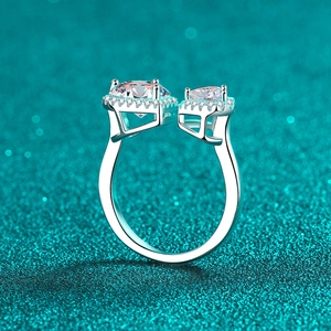 S925 sterling silver open ring with double halo heart moissanite on blue glitter background