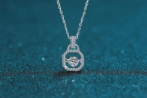 Macro shot of 925 silver necklace with dancing moissanite stone on starry blue background