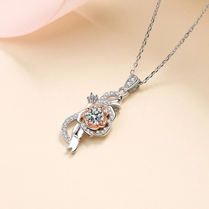 Elegant 925 sterling silver rose necklace with moissanite and two-tone gold accents