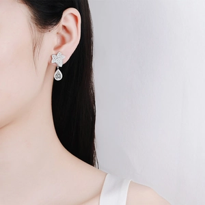 Sparkling S925 sterling silver drop earrings with star and pear-cut moissanite stones