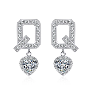 S925 sterling silver Q-letter stud earrings featuring heart-shaped moissanite stones