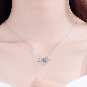 S925 sterling silver winged moissanite pendant necklace on female model neck