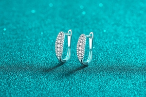 Detailed close-up of S925 sterling silver U-shaped earrings with multi-row pavé crystals
