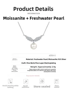 Detail showing S925 silver angel wing necklace with 10mm pearl and moissanite stone