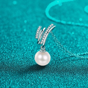 Elegant S925 silver necklace featuring a pearl pendant with a crisscross pavé diamond design
