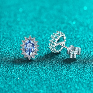 Classic S925 silver halo stud earrings featuring oval blue moissanite and pave diamonds