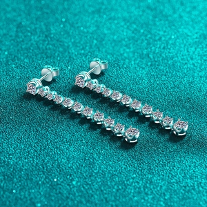 Elegant S925 sterling silver drop earrings featuring a linear row of brilliant moissanite