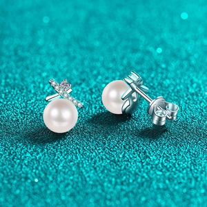 S925 sterling silver pearl stud earrings featuring a crisscross design with moissanite accents