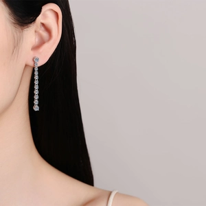 Elegant S925 sterling silver long tassel drop earrings featuring a sparkling moissanite row