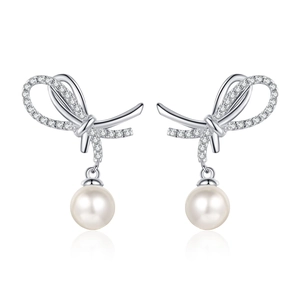 Elegant S925 silver bow earrings with moissanite accents and round white pearls