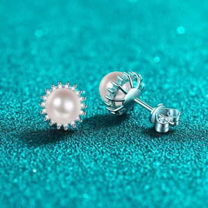 Elegant S925 silver sunflower moissanite pearl stud earrings on a green starry background