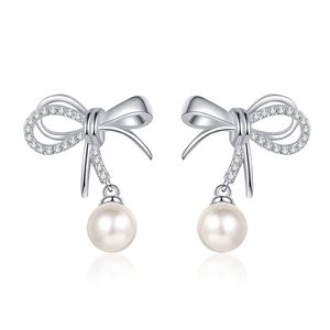 Elegant S925 silver bow earrings with moissanite accents and white round pearls