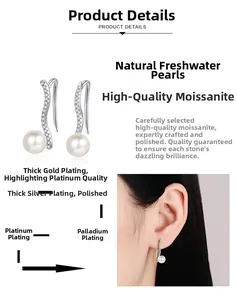 Detail of wavy silver earrings with natural freshwater pearls and moissanite stones