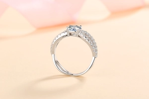 Detailed shot of S925 silver moissanite ring with twisted band and four-prong setting