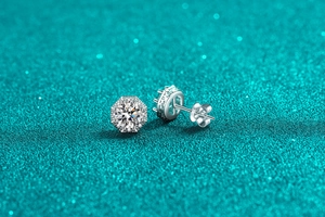 Macro view of S925 silver hexagonal halo moissanite studs with butterfly backings