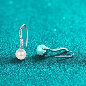Elegant S925 silver wave earrings with row diamonds and pearls on a blue glitter background
