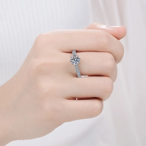 Elegant S925 sterling silver crown six-prong moissanite ring worn on model hand