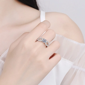 Elegant S925 sterling silver moissanite ring with a twisted infinity band on finger