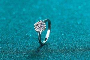 Macro detail of Moissanite stone on S925 silver ring with floral petal setting