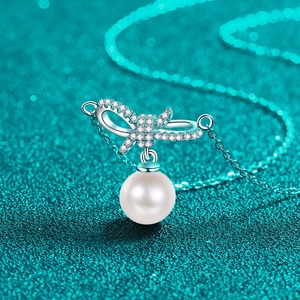 S925 silver bow necklace with moissanite diamond and a lustrous round pearl pendant