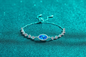 Detailed shot of S925 sterling silver bracelet with marquise blue stone and fine crystals