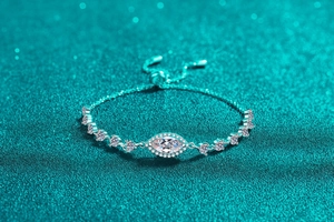 Close-up of S925 sterling silver bracelet with marquise-cut blue stone and adjustable clasp
